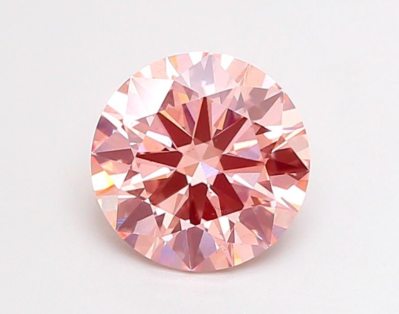 Ideal Loose Diamond - ROUND 2.1ct Fancy Vivid Pink SI1: Ideal Loose Diamond - ROUND 2.1ct Fancy Vivid Pink SI1 Source: This is a real non-mined Diamond that has been grown in a lab Shape: ROUND Carats: 2.1 Color: Fancy Vivid Pink Certification: IGI Video: