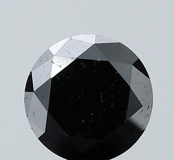 Loose Diamond - ROUND 0.97ct Fancy Black VS2: Loose Diamond - ROUND 0.97ct Fancy Black VS2 Source: Natural Shape: ROUND Carats: 0.97 Color: Fancy Black Certification: NONE Video: