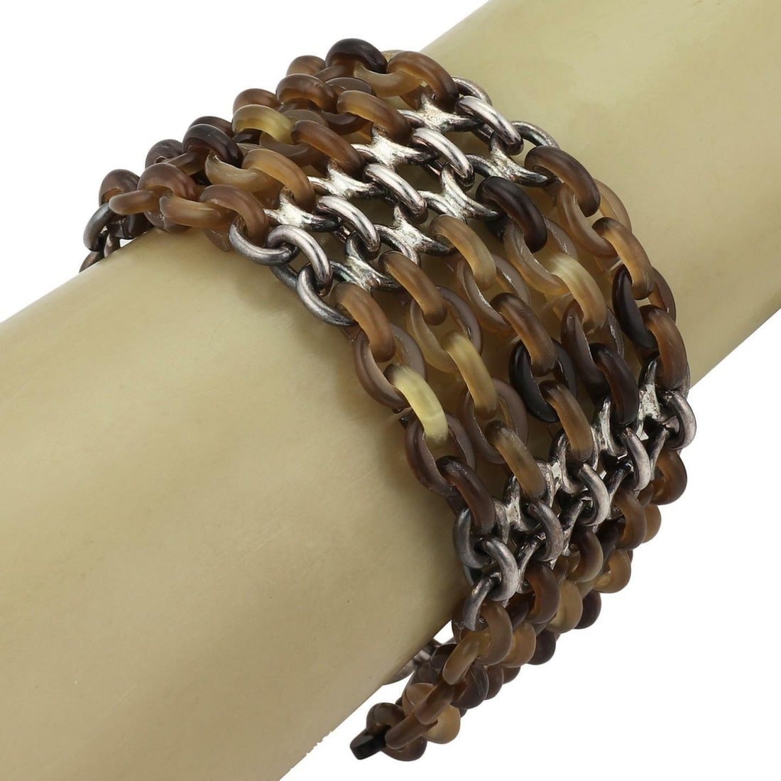 Hermes Sterling Silver Buffalo Horn 5 Row Chain Link Bracelet: Hermes Sterling Silver Buffalo Horn 5 Row Chain Link Bracelet This exquisite bracelet from Hermes showcases a unique design with alternating oval chain links made of sterling silver and buffalo horn.