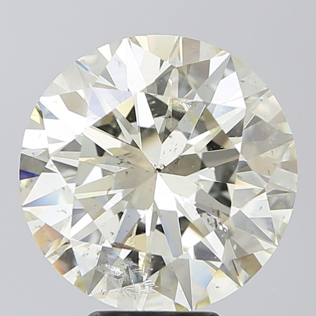 Loose Diamond - ROUND 7.09ct L SI2: Loose Diamond - ROUND 7.09ct L SI2 Source: Natural Shape: ROUND Carats: 7.09 Color: L Clarity: SI2 Certification: IGI Video:
