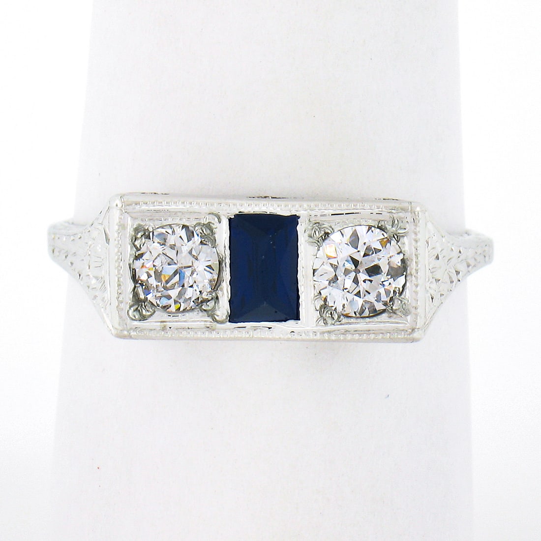 Antique Art Deco 20k White Gold Diamond Sapphire Moi et Toi Ring: Antique Art Deco 20k White Gold Diamond Sapphire Moi et Toi Ring This exquisite Antique Art Deco Moi et Toi Band Ring is crafted from solid 20k white gold, showcasing an elegant combination of two old