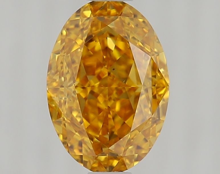 Loose Diamond - OVAL 1.05ct Fancy Vivid Yellow Orange SI1: Loose Diamond - OVAL 1.05ct Fancy Vivid Yellow Orange SI1 Source: Natural Shape: OVAL Carats: 1.05 Color: Fancy Vivid Yellow Orange Certification: GIA Video: