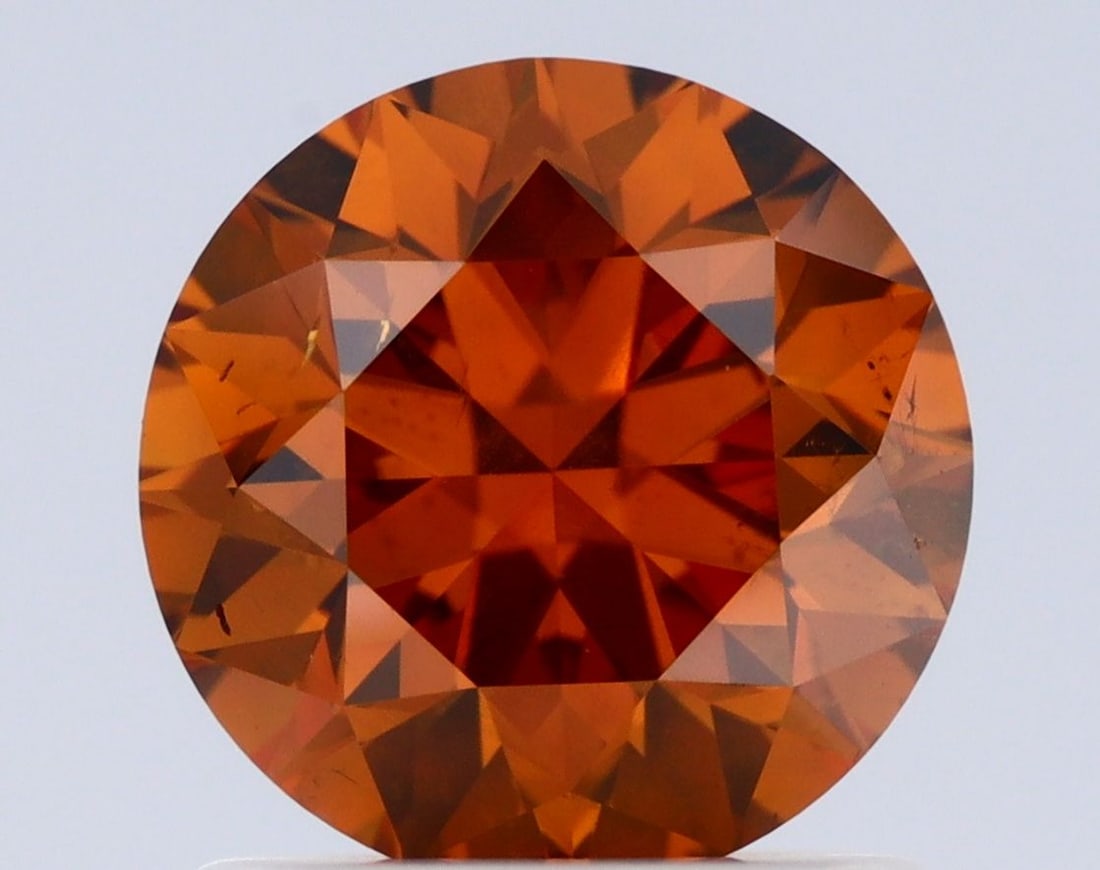 Loose Diamond - ROUND 1.19ct Fancy Deep Yellow Orange I1: Loose Diamond - ROUND 1.19ct Fancy Deep Yellow Orange I1 Source: Natural Shape: ROUND Carats: 1.19 Color: Fancy Deep Yellow Orange Certification: GIA Video: