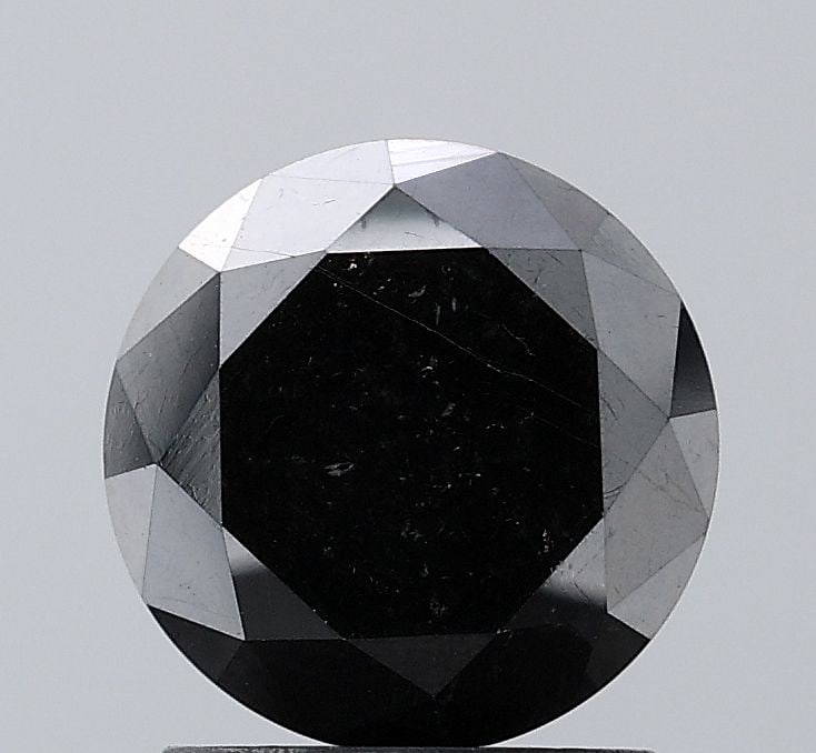 Loose Diamond - ROUND 1.9ct Black VVS2: Loose Diamond - ROUND 1.9ct Black VVS2 Source: Natural Shape: ROUND Carats: 1.9 Color: Black Certification: NONE Video: