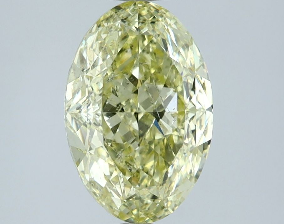 Loose Diamond - OVAL 1.51ct Fancy Yellow SI2: Loose Diamond - OVAL 1.51ct Fancy Yellow SI2 Source: Natural Shape: OVAL Carats: 1.51 Color: Fancy Yellow Certification: GIA Video: