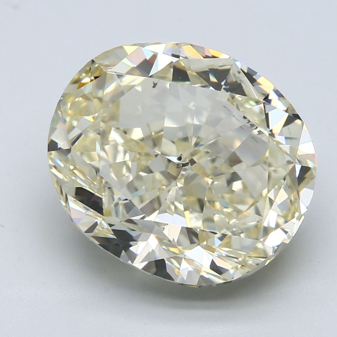 Loose Diamond - OVAL 12.13ct Fancy Light Brownish Yellow SI1: Loose Diamond - OVAL 12.13ct Fancy Light Brownish Yellow SI1 Source: Natural Shape: OVAL Carats: 12.13 Color: Fancy Light Brownish Yellow Certification: GIA The Diamond Depot Guarantee: All items in t
