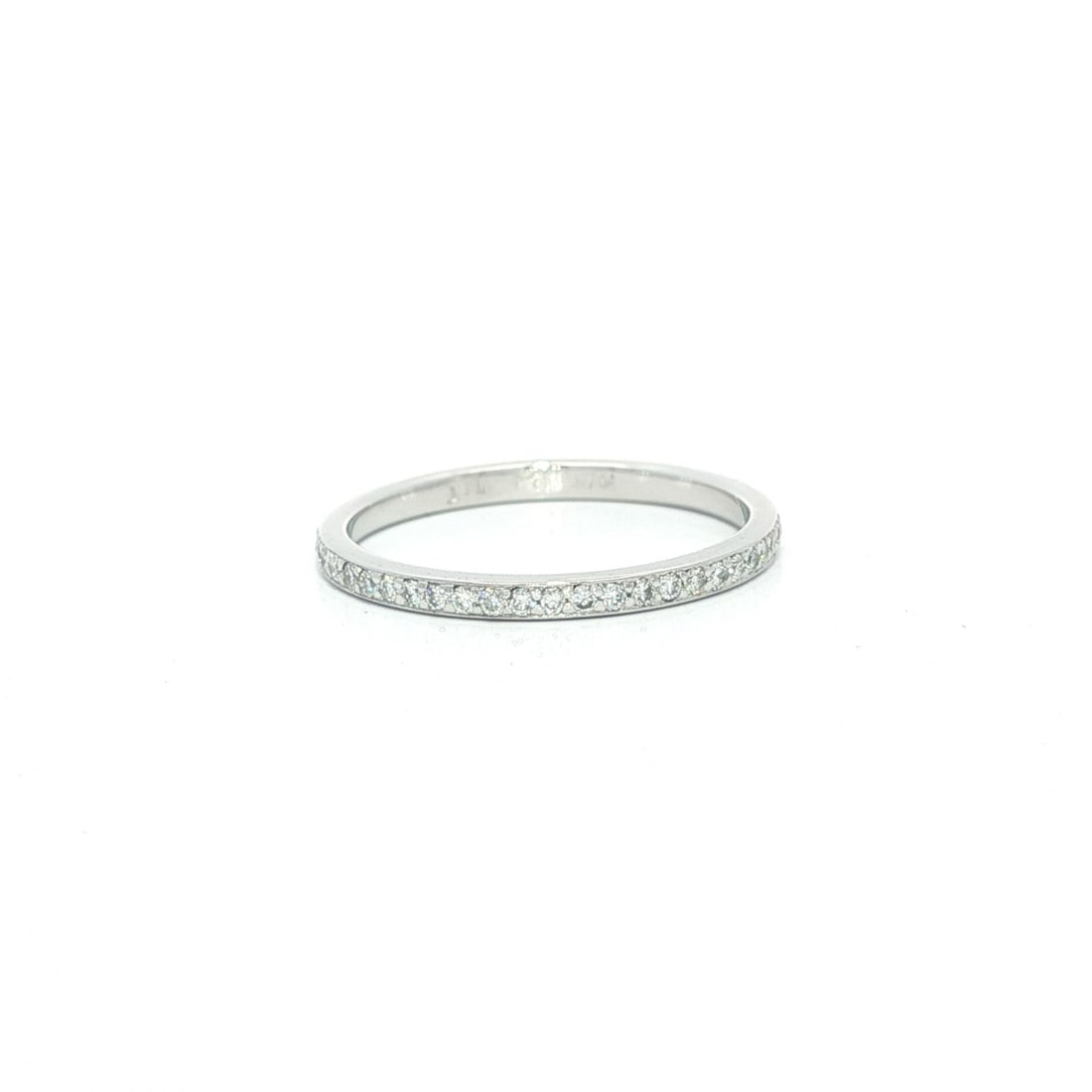 Platinum 0.45ctw Round Pave Diamond Stack Eternity Band Ring: Platinum 0.45ctw Round Pave Diamond Stack Eternity Band Ring This exquisite Platinum Petite Stack Eternity Wedding Band Ring showcases a delicate design adorned with 51 natural genuine diamonds. Each