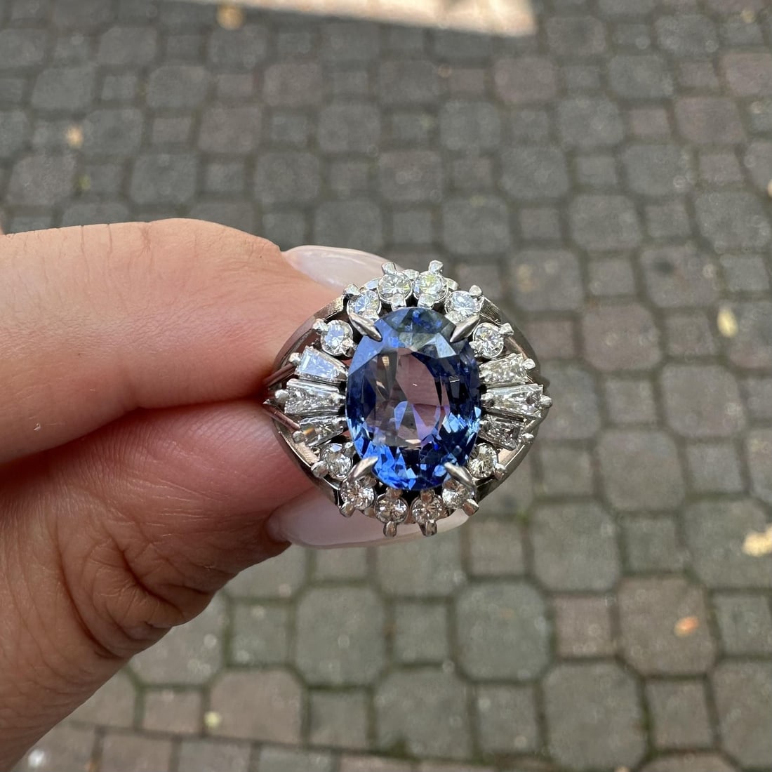 Vintage GIA 6.07ctw No Heat Sapphire Diamond Platinum Cocktail Ring: Vintage GIA 6.07ctw No Heat Sapphire Diamond Platinum Cocktail Ring This exquisite vintage cocktail ring showcases a stunning natural sapphire, weighing 5.25ct, prominently featured in an oval brillia