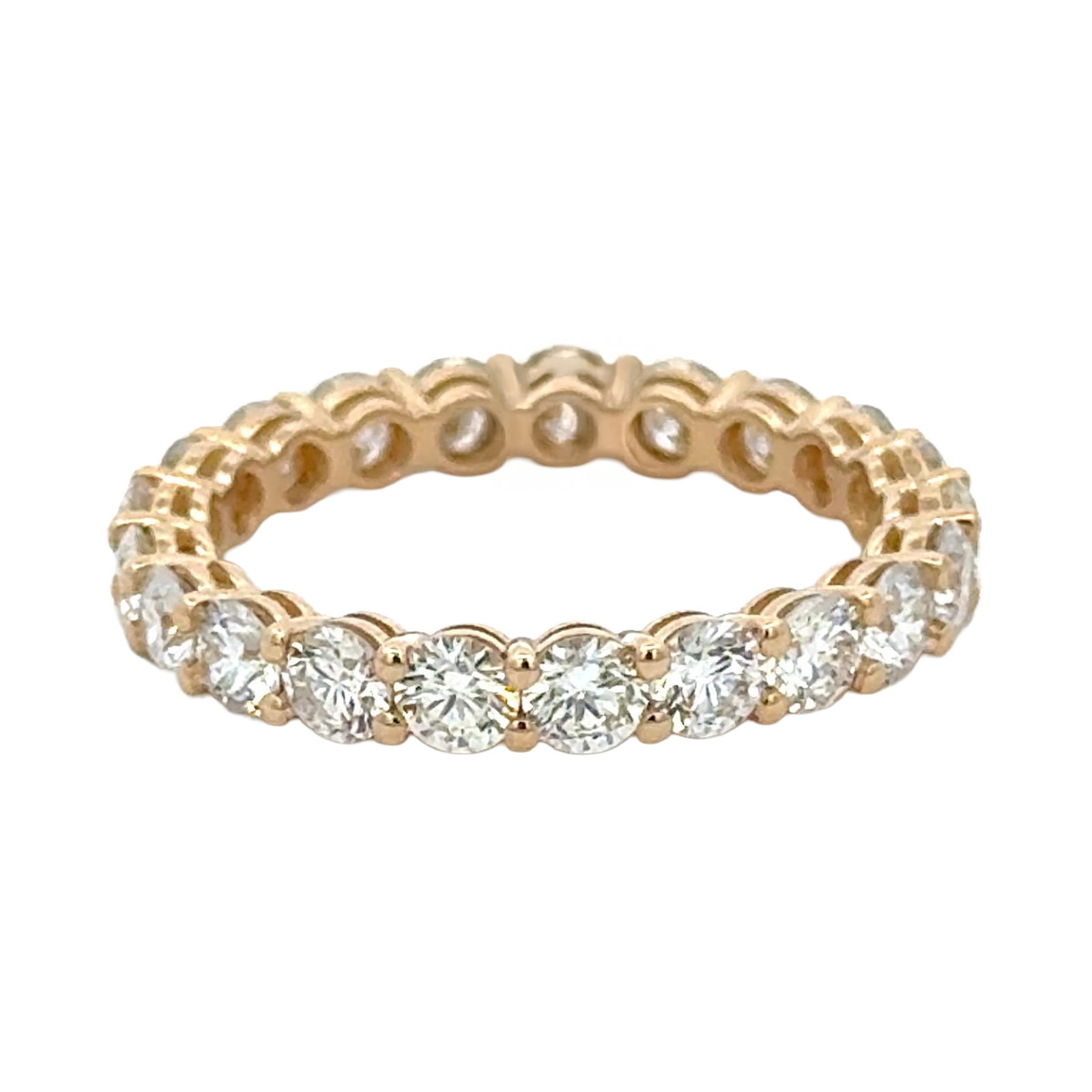 2.17 Carat Round Diamond Band in 14k Yellow Gold G VS2-SI1: 2.17 Carat Round Diamond Band in 14k Yellow Gold G VS2-SI1 This contemporary wedding band is crafted from 14 karat yellow gold and features 21 round brilliant cut diamonds set in an airline mounting.