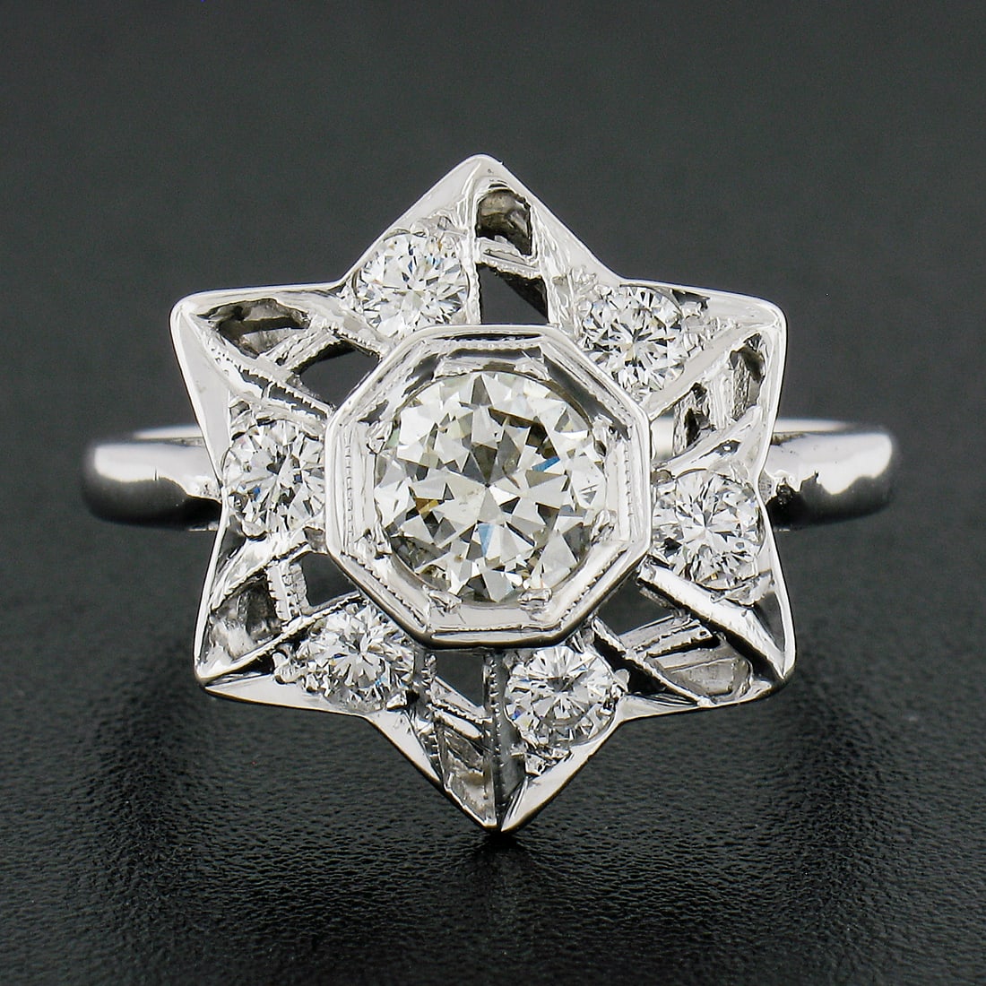 Vintage 14k White Gold 1.12ctw Diamond Star Cocktail Ring: Vintage 14k White Gold 1.12ctw Diamond Star Cocktail Ring This exquisite vintage cocktail ring features a striking large star design crafted from solid 14k white gold. It showcases a total of 1.12 car