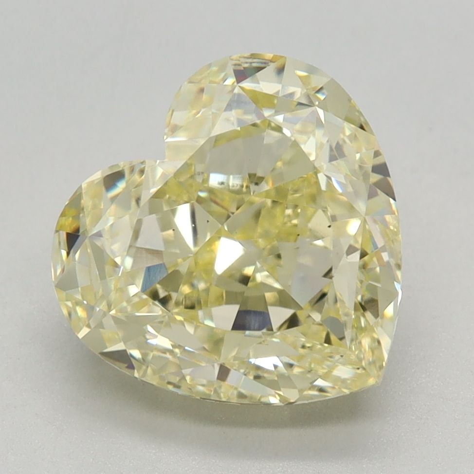 Loose Diamond - HEART 3.1ct Fancy Light Yellow VS1: Loose Diamond - HEART 3.1ct Fancy Light Yellow VS1 Source: This is a real non-mined Diamond that has been grown in a lab Shape: HEART Carats: 3.1 Color: Fancy Light Yellow Certification: IGI Video: