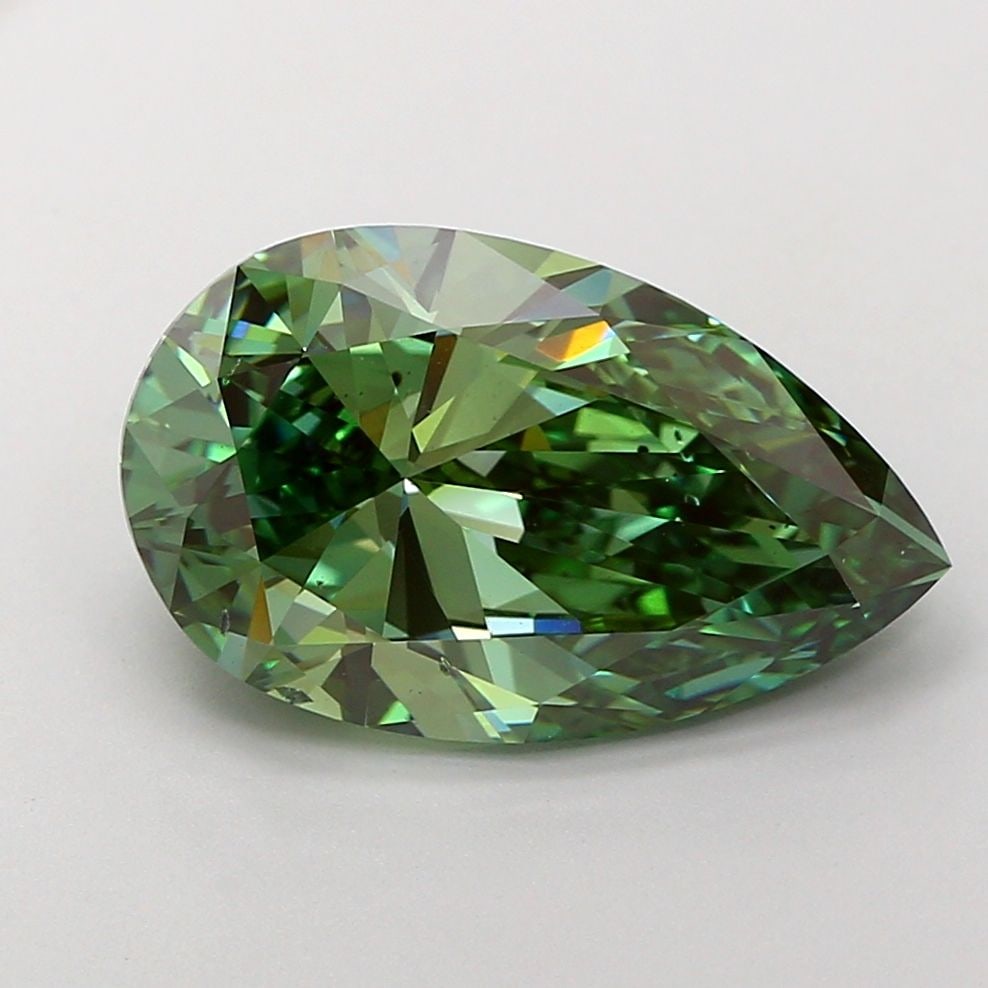 Loose Diamond - PEAR 5.01ct Fancy Vivid Green SI1: Loose Diamond - PEAR 5.01ct Fancy Vivid Green SI1 Source: This is a real non-mined Diamond that has been grown in a lab Shape: PEAR Carats: 5.01 Color: Fancy Vivid Green Certification: IGI Video:
