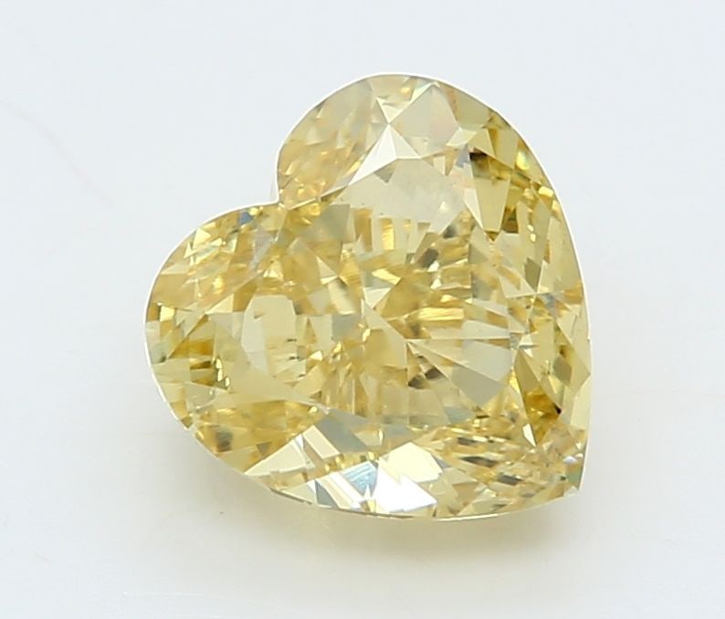 Loose Diamond - HEART 4.06ct Fancy Intense Yellow VVS2: Loose Diamond - HEART 4.06ct Fancy Intense Yellow VVS2 Source: This is a real non-mined Diamond that has been grown in a lab Shape: HEART Carats: 4.06 Color: Fancy Intense Yellow Certification: IGI Vi