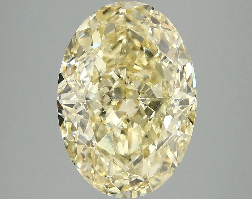 Loose Diamond - OVAL 5.06ct Fancy Intense Yellow VVS2: Loose Diamond - OVAL 5.06ct Fancy Intense Yellow VVS2 Source: This is a real non-mined Diamond that has been grown in a lab Shape: OVAL Carats: 5.06 Color: Fancy Intense Yellow Certification: IGI Vide