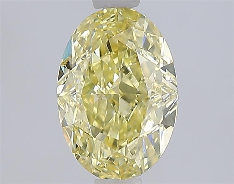 Loose Diamond - OVAL 1.55ct Fancy Yellow VS1: Loose Diamond - OVAL 1.55ct Fancy Yellow VS1 Source: This is a real non-mined Diamond that has been grown in a lab Shape: OVAL Carats: 1.55 Color: Fancy Yellow Certification: IGI Video: