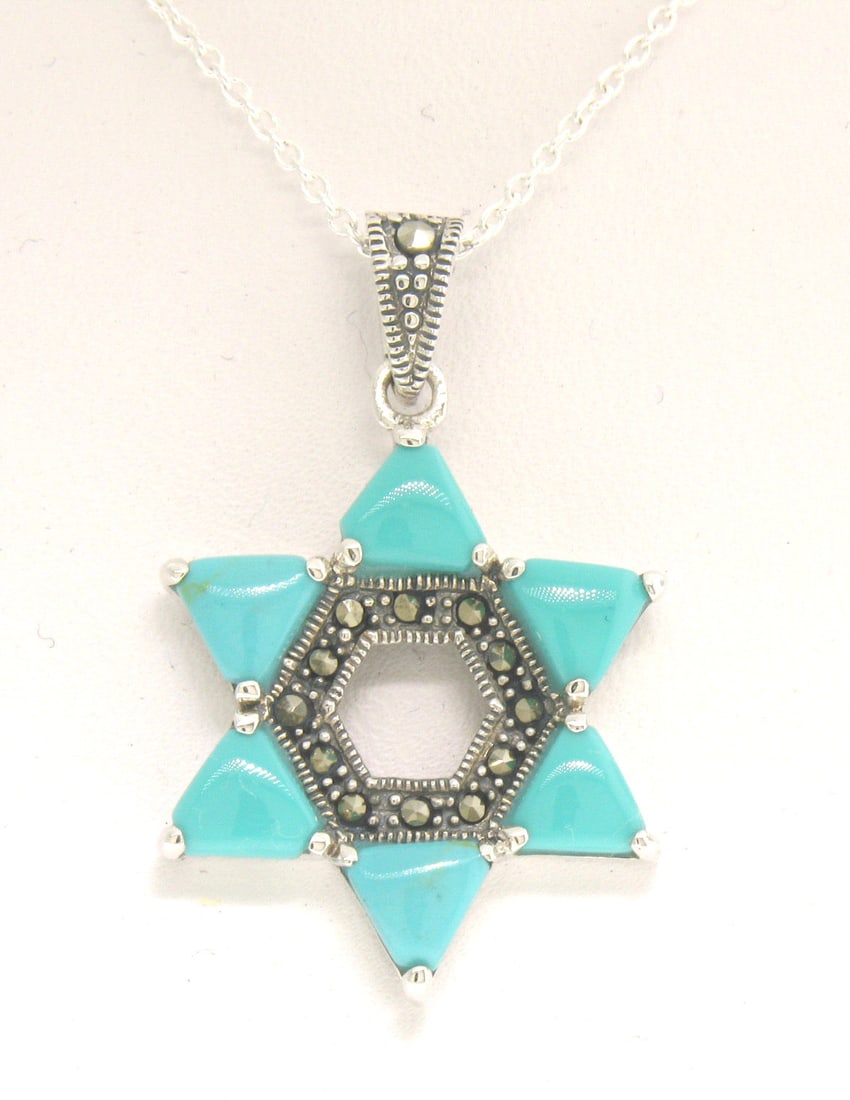 Marcasite Sterling Silver 18" Turquoise Star of David Pendant Necklace: Marcasite Sterling Silver 18" Turquoise Star of David Pendant Necklace This exquisite pendant features a stunning Star of David design crafted in solid .925 sterling silver, adorned with six trillion-