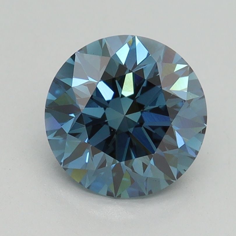 Loose Diamond - ROUND 1.6ct Fancy Vivid Blue VS2: Loose Diamond - ROUND 1.6ct Fancy Vivid Blue VS2 Source: This is a real non-mined Diamond that has been grown in a lab Shape: ROUND Carats: 1.6 Color: Fancy Vivid Blue Certification: IGI Video: