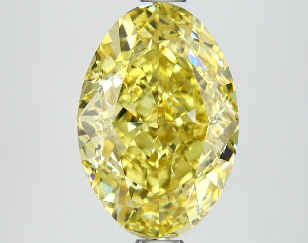 Loose Diamond - OVAL 2.95ct Fancy Vivid Yellow VVS2: Loose Diamond - OVAL 2.95ct Fancy Vivid Yellow VVS2 Source: This is a real non-mined Diamond that has been grown in a lab Shape: OVAL Carats: 2.95 Color: Fancy Vivid Yellow Certification: IGI Video: