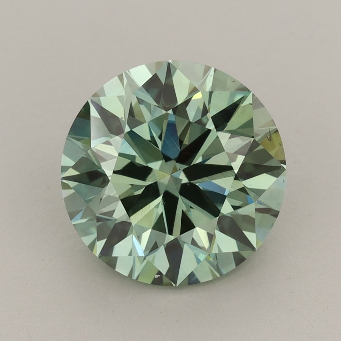 Loose Diamond - ROUND 4.19ct Fancy Vivid Green VS2: Loose Diamond - ROUND 4.19ct Fancy Vivid Green VS2 Source: This is a real non-mined Diamond that has been grown in a lab Shape: ROUND Carats: 4.19 Color: Fancy Vivid Green Certification: IGI Video: