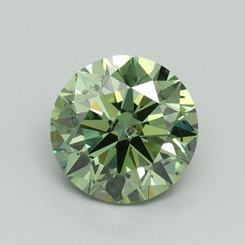 Loose Diamond - ROUND 1.24ct Fancy Vivid Green SI2: Loose Diamond - ROUND 1.24ct Fancy Vivid Green SI2 Source: This is a real non-mined Diamond that has been grown in a lab Shape: ROUND Carats: 1.24 Color: Fancy Vivid Green Certification: IGI Video: