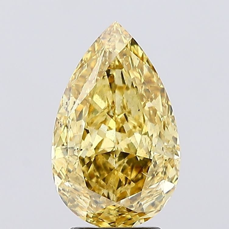 Loose Diamond - PEAR 3.58ct Fancy Vivid Yellow SI1: Loose Diamond - PEAR 3.58ct Fancy Vivid Yellow SI1 Source: This is a real non-mined Diamond that has been grown in a lab Shape: PEAR Carats: 3.58 Color: Fancy Vivid Yellow Certification: IGI Video:
