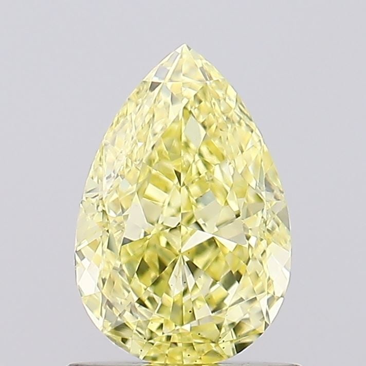 Loose Diamond - PEAR 1.01ct Fancy Vivid Yellow VS2: Loose Diamond - PEAR 1.01ct Fancy Vivid Yellow VS2 Source: This is a real non-mined Diamond that has been grown in a lab Shape: PEAR Carats: 1.01 Color: Fancy Vivid Yellow Certification: IGI Video: