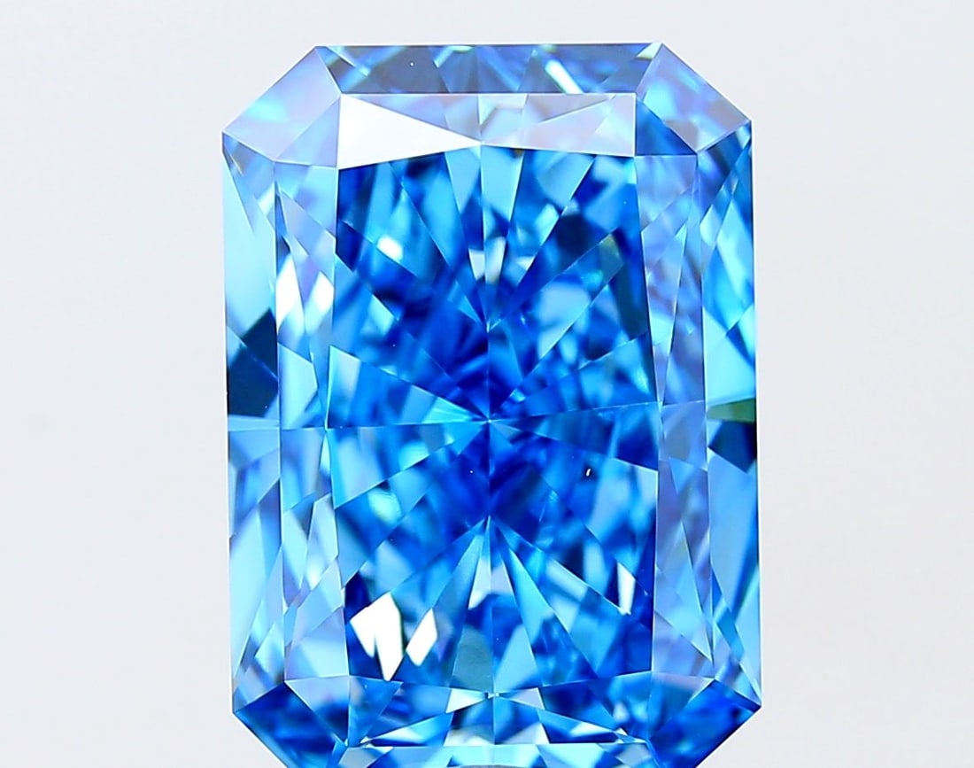 Loose Diamond - RADIANT 10.03ct Fancy Vivid Blue VVS2: Loose Diamond - RADIANT 10.03ct Fancy Vivid Blue VVS2 Source: This is a real non-mined Diamond that has been grown in a lab Shape: RADIANT Carats: 10.03 Color: Fancy Vivid Blue Certification: IGI The