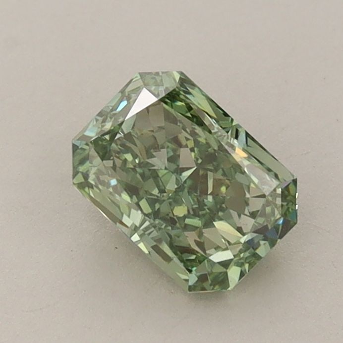 Loose Diamond - RADIANT 0.79ct Fancy Vivid Green VS1: Loose Diamond - RADIANT 0.79ct Fancy Vivid Green VS1 Source: This is a real non-mined Diamond that has been grown in a lab Shape: RADIANT Carats: 0.79 Color: Fancy Vivid Green Certification: IGI Video