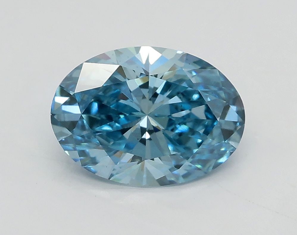Loose Diamond - OVAL 1.43ct Fancy Vivid Blue VS2: Loose Diamond - OVAL 1.43ct Fancy Vivid Blue VS2 Source: This is a real non-mined Diamond that has been grown in a lab Shape: OVAL Carats: 1.43 Color: Fancy Vivid Blue Certification: IGI Video: