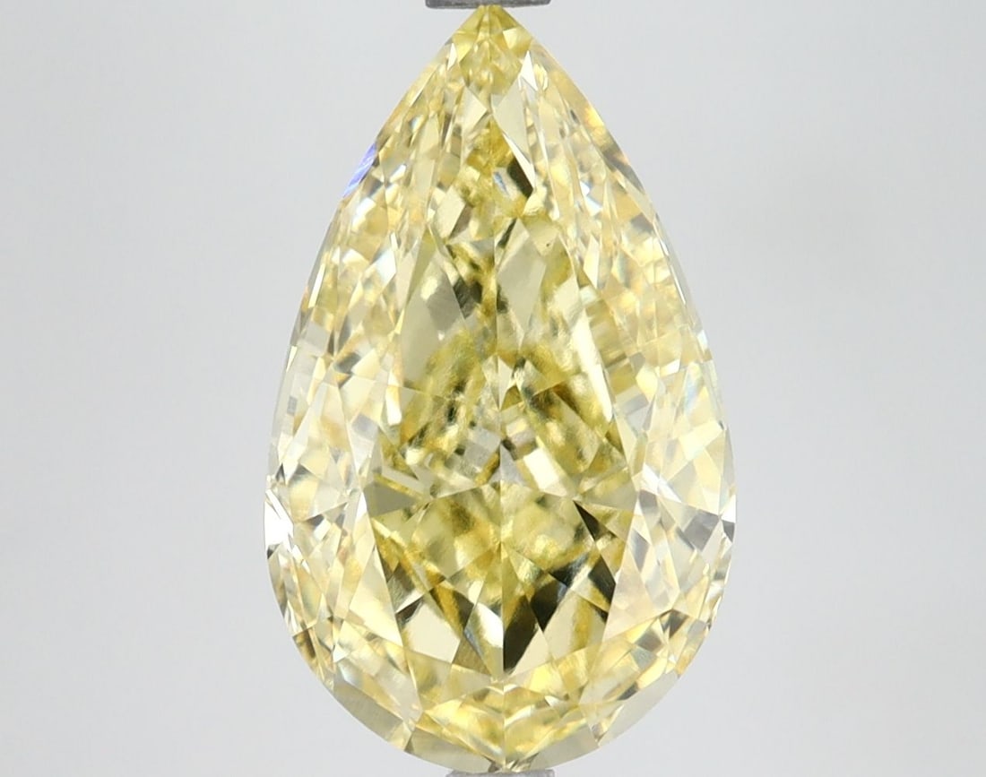 Loose Diamond - PEAR 3.67ct Fancy Vivid Yellow VS1: Loose Diamond - PEAR 3.67ct Fancy Vivid Yellow VS1 Source: This is a real non-mined Diamond that has been grown in a lab Shape: PEAR Carats: 3.67 Color: Fancy Vivid Yellow Certification: IGI Video: