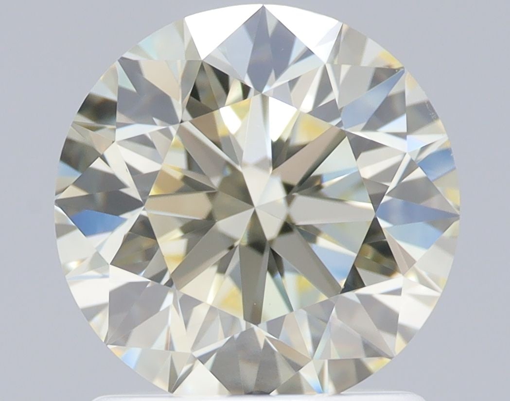 Loose Diamond - ROUND 1.41ct O-P VVS1: Loose Diamond - ROUND 1.41ct O-P VVS1 Source: Natural Shape: ROUND Carats: 1.41 Color: O-P Certification: IGI Video: