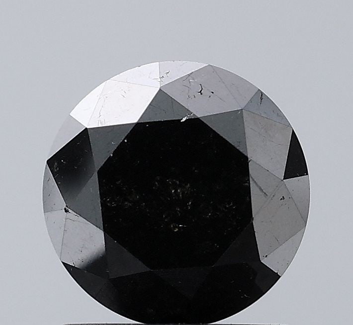 Loose Diamond - ROUND 1.78ct Fancy Black VS2: Loose Diamond - ROUND 1.78ct Fancy Black VS2 Source: Natural Shape: ROUND Carats: 1.78 Color: Fancy Black Certification: NONE Video: