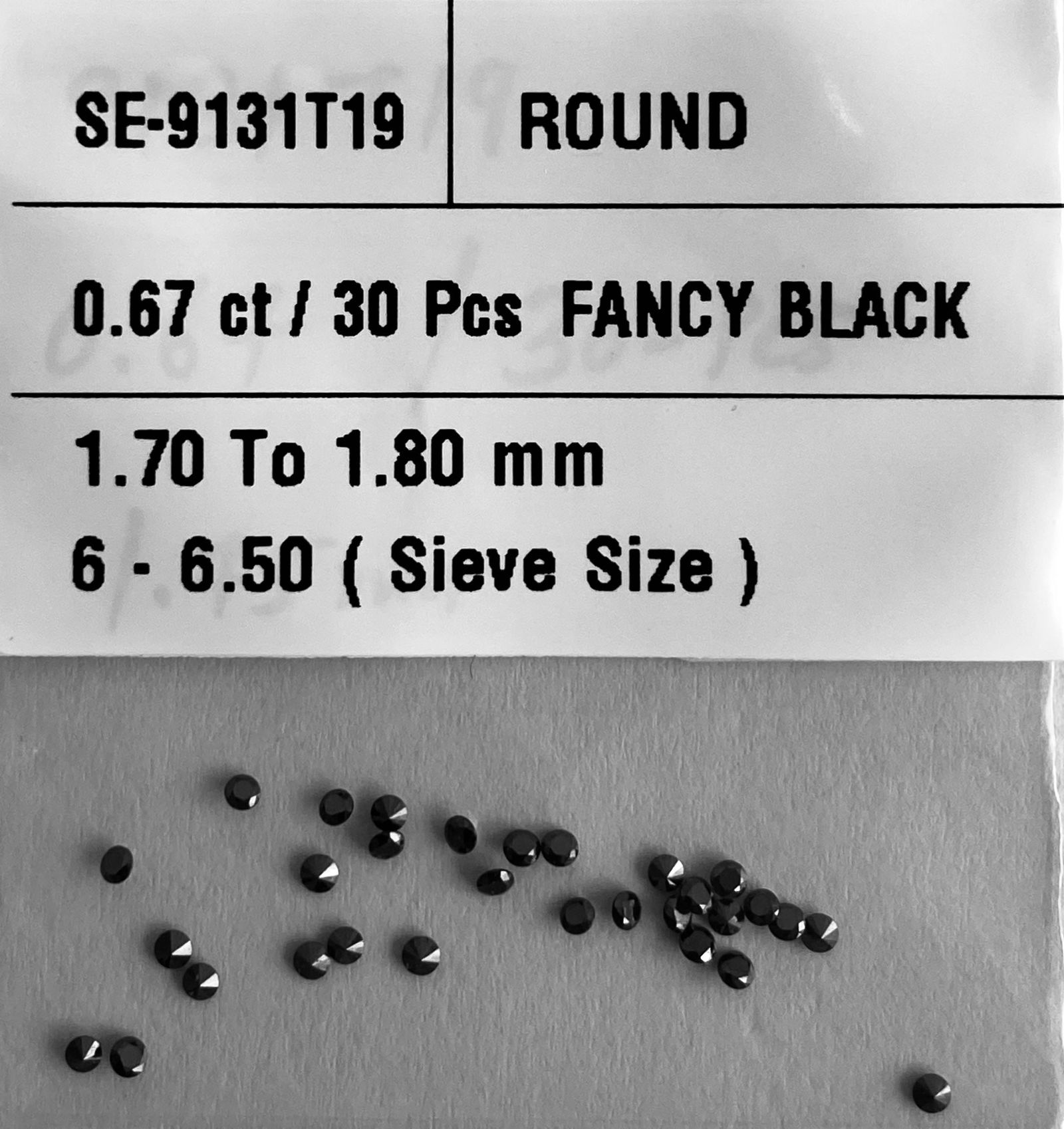 Loose Diamond - ROUND 0.67ct Fancy Black VVS2: Loose Diamond - ROUND 0.67ct Fancy Black VVS2 Source: Natural Shape: ROUND Carats: 0.67 Color: Fancy Black Certification: NONE The Diamond Depot Guarantee: All items in this auction are guaranteed to