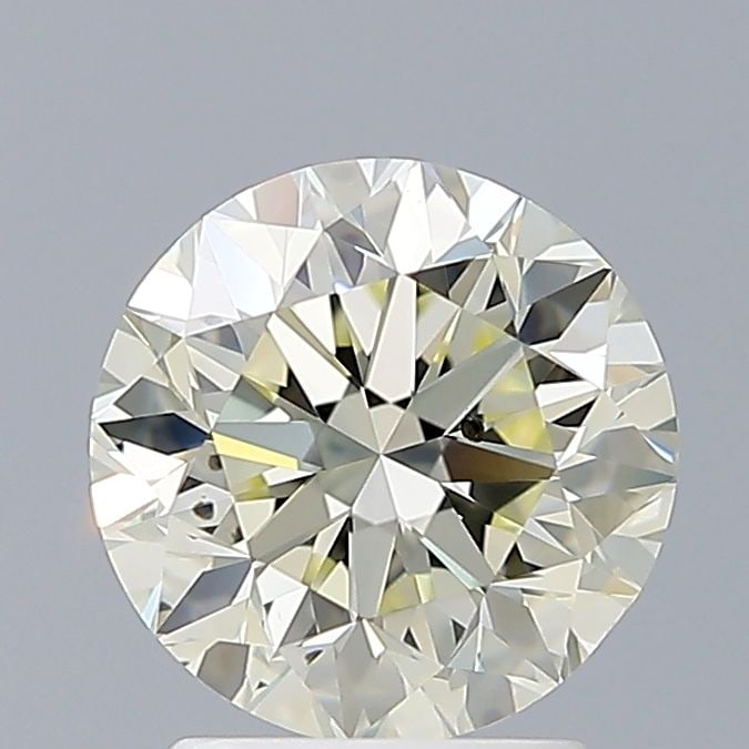 Loose Diamond - ROUND 2.07ct O-P SI1: Loose Diamond - ROUND 2.07ct O-P SI1 Source: Natural Shape: ROUND Carats: 2.07 Color: O-P Certification: NONE Video: