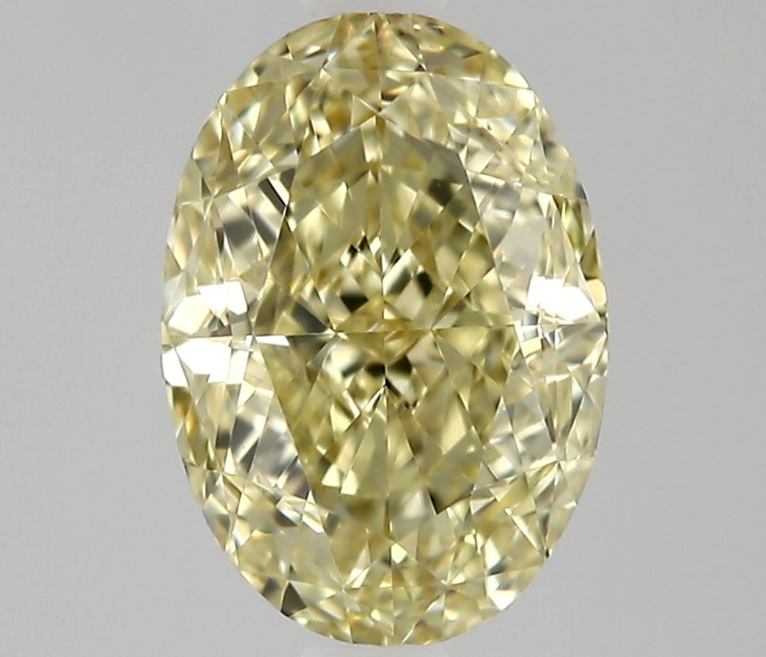 Loose Diamond - OVAL 0.7ct Fancy Light Yellow VS1: Loose Diamond - OVAL 0.7ct Fancy Light Yellow VS1 Source: Natural Shape: OVAL Carats: 0.7 Color: Fancy Light Yellow Certification: GIA Video: