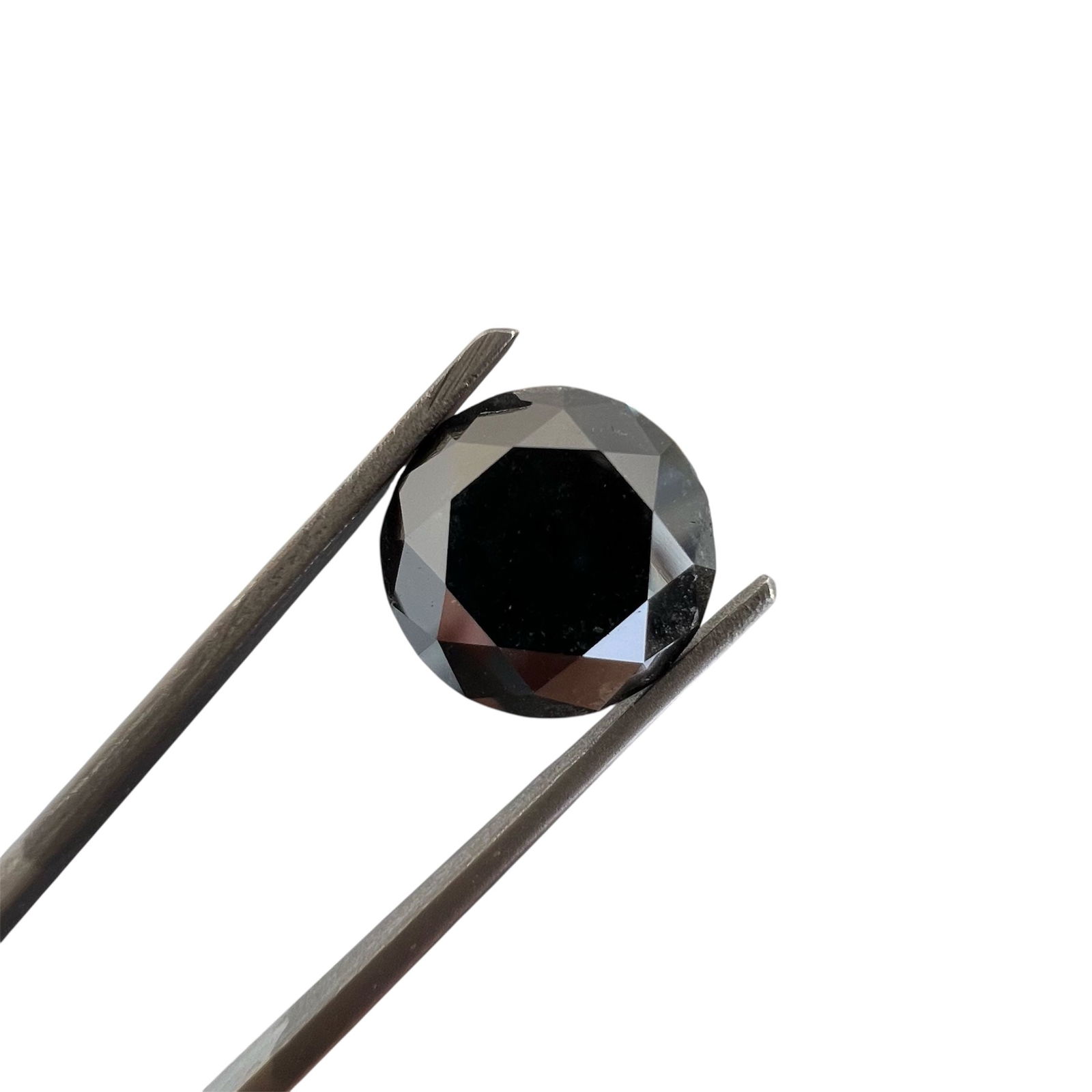Loose Diamond - ROUND 4.14ct Fancy Black: Loose Diamond - ROUND 4.14ct Fancy Black Source: Natural Shape: ROUND Carats: 4.14 Color: Fancy Black Certification: GIA The Diamond Depot Guarantee: All items in this auction are guaranteed to be 100