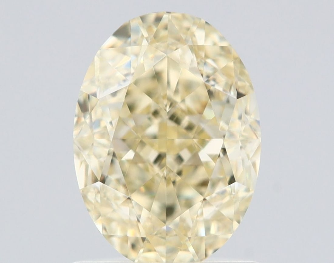 Loose Diamond - OVAL 1.34ct Fancy Light Yellow VVS1: Loose Diamond - OVAL 1.34ct Fancy Light Yellow VVS1 Source: Natural Shape: OVAL Carats: 1.34 Color: Fancy Light Yellow Certification: GIA Video: