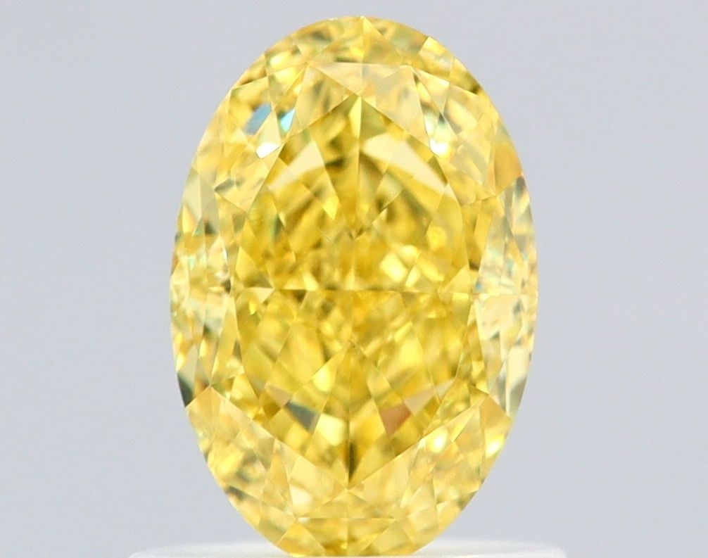 Loose Diamond - OVAL 1.01ct Fancy Vivid Yellow VS2: Loose Diamond - OVAL 1.01ct Fancy Vivid Yellow VS2 Source: Natural Shape: OVAL Carats: 1.01 Color: Fancy Vivid Yellow Certification: GIA Video: