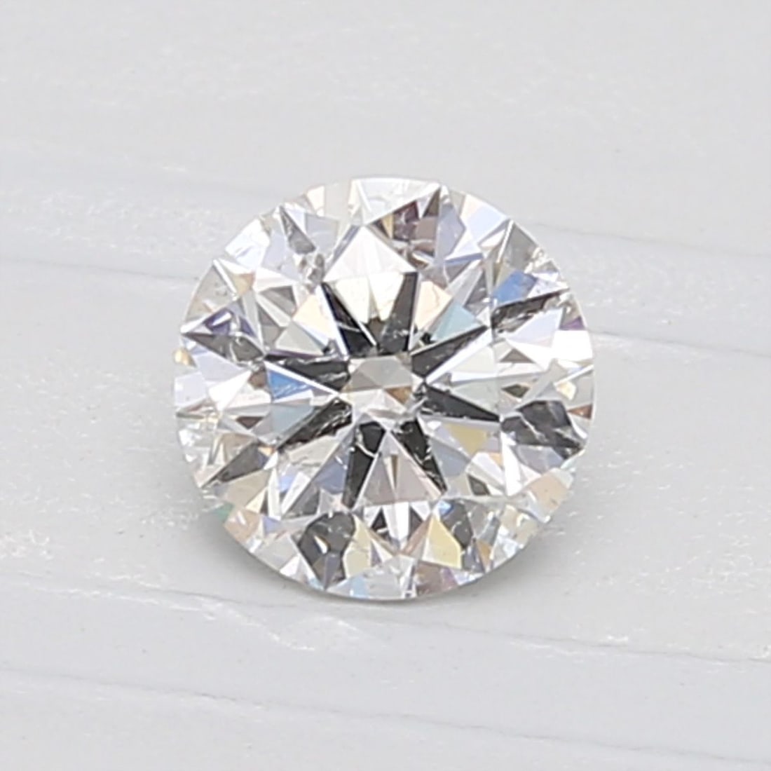 Loose Diamond - ROUND 0.6ct E I1: Loose Diamond - ROUND 0.6ct E I1 Source: Natural Shape: ROUND Carats: 0.6 Color: E Clarity: I1 Certification: GIA Video: