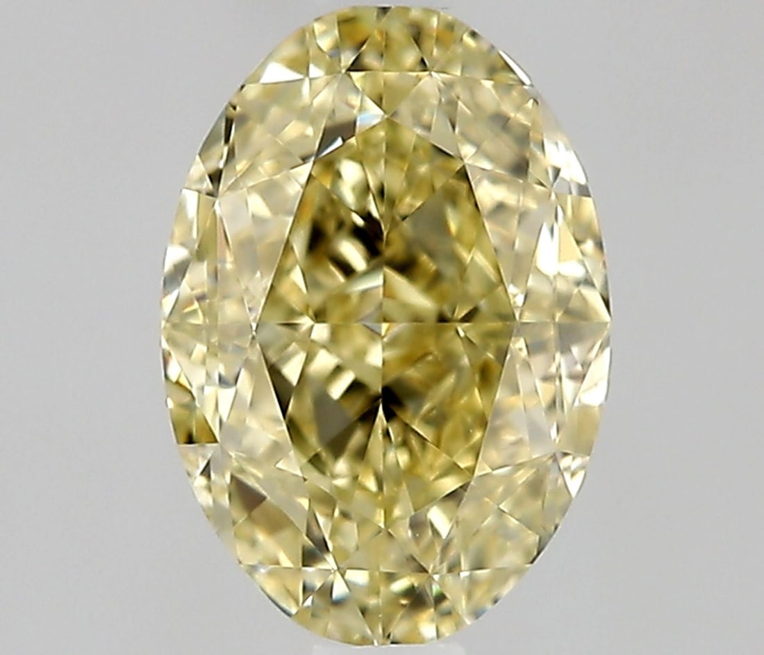 Loose Diamond - OVAL 0.65ct Fancy Yellow VVS1: Loose Diamond - OVAL 0.65ct Fancy Yellow VVS1 Source: Natural Shape: OVAL Carats: 0.65 Color: Fancy Yellow Certification: GIA Video: