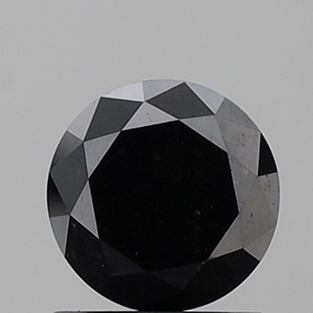 Loose Diamond - ROUND 1.16ct Fancy Black VVS2: Loose Diamond - ROUND 1.16ct Fancy Black VVS2 Source: Natural Shape: ROUND Carats: 1.16 Color: Fancy Black Certification: NONE Video: