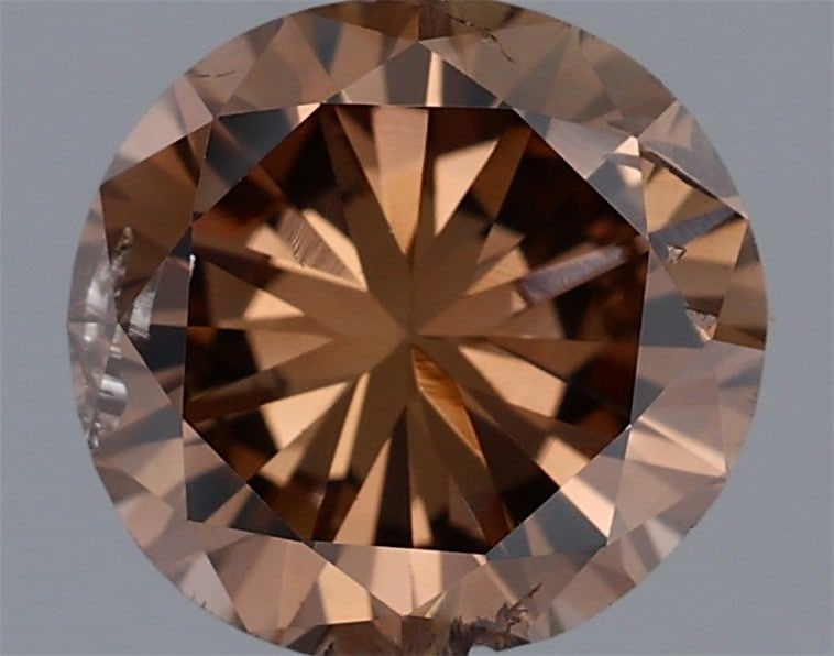 Loose Diamond - ROUND 1.09ct Fancy Dark Orangey Brown: Loose Diamond - ROUND 1.09ct Fancy Dark Orangey Brown Source: Natural Shape: ROUND Carats: 1.09 Color: Fancy Dark Orangey Brown Certification: GIA Video: