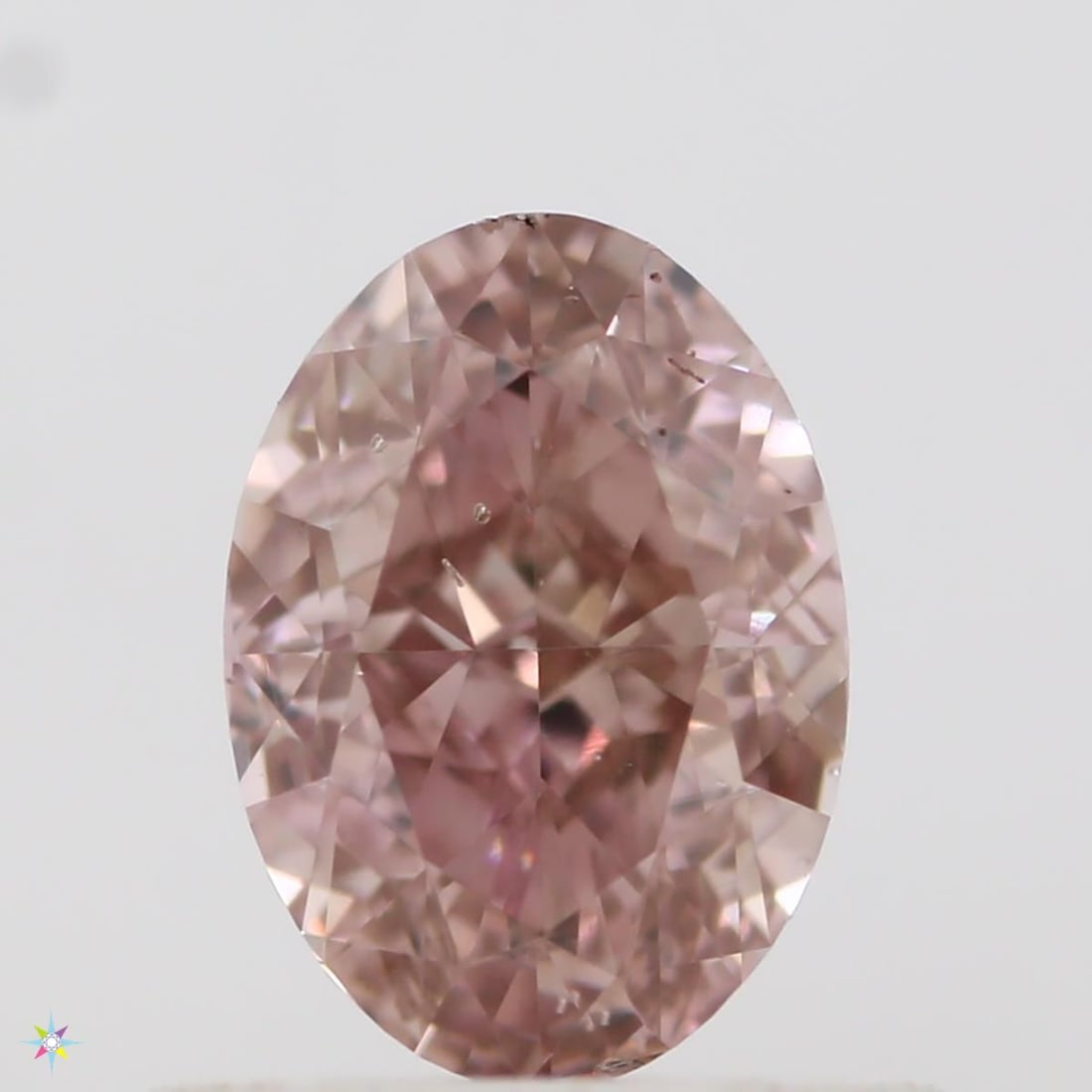 Loose Diamond - OVAL 0.65ct Fancy Orangey Pink SI1: Loose Diamond - OVAL 0.65ct Fancy Orangey Pink SI1 Source: Natural Shape: OVAL Carats: 0.65 Color: Fancy Orangey Pink Certification: GIA Video: