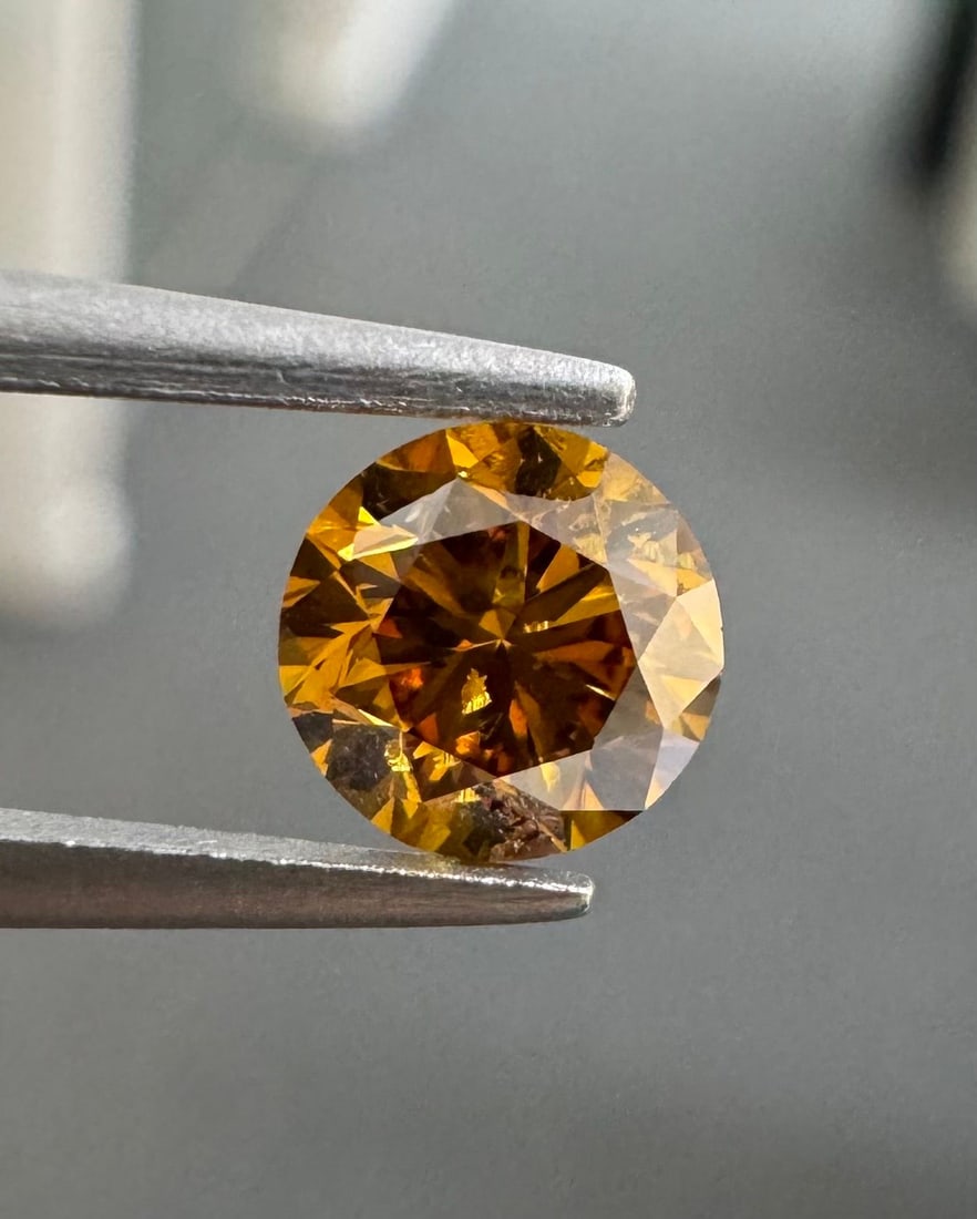 Loose Diamond - ROUND 0.47ct Fancy Deep Brownish Yellowish Orange SI2: Loose Diamond - ROUND 0.47ct Fancy Deep Brownish Yellowish Orange SI2 Source: Natural Shape: ROUND Carats: 0.47 Color: Fancy Deep Brownish Yellowish Orange Certification: GIA Video: