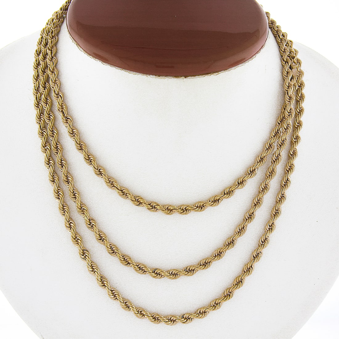 Vintage 46" 4mm Thick Yellow Gold Rope Link Necklace: Vintage 46" 4mm Thick Yellow Gold Rope Link Necklace This exquisite vintage necklace features a classic 46-inch long rope link design, crafted from solid 13-14K yellow gold. With a thickness of 4mm, t