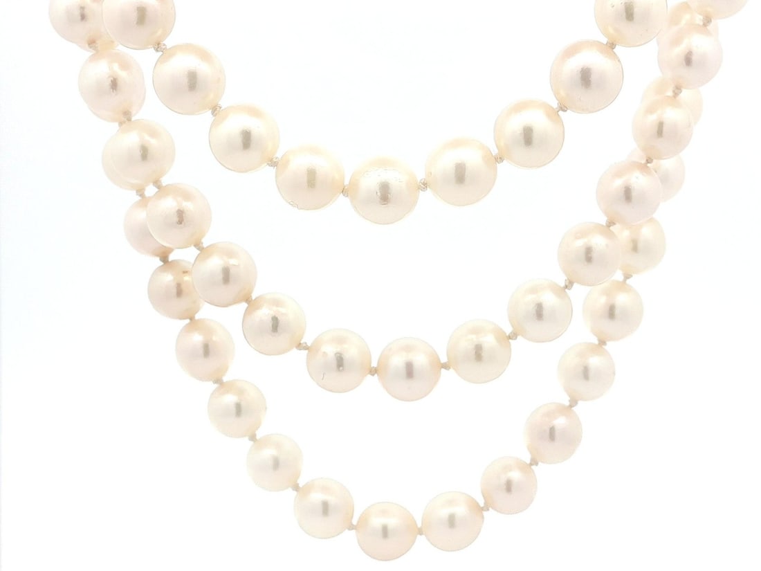 52 Inch GIA Certified Akoya Pearl Necklace with Pink Green Overtone: 52 Inch GIA Certified Akoya Pearl Necklace with Pink Green Overtone This exquisite 52" long Akoya pearl strand necklace showcases a beautiful array of (137) genuine cultured saltwater Akoya pearls. Fe