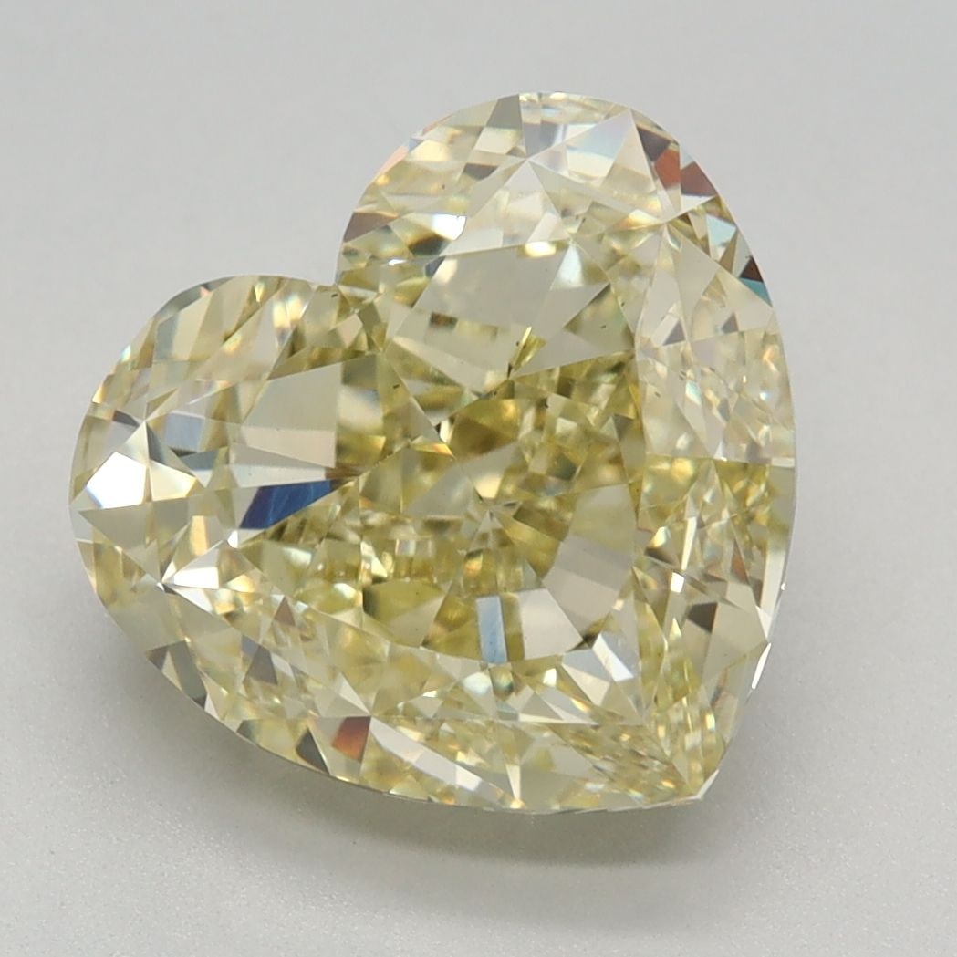 Loose Diamond - HEART 4.14ct Fancy Intense Yellow VS2: Loose Diamond - HEART 4.14ct Fancy Intense Yellow VS2 Source: This is a real non-mined Diamond that has been grown in a lab Shape: HEART Carats: 4.14 Color: Fancy Intense Yellow Certification: IGI Vid