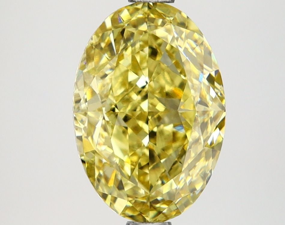 Loose Diamond - OVAL 2.63ct Fancy Vivid Yellow VS1: Loose Diamond - OVAL 2.63ct Fancy Vivid Yellow VS1 Source: This is a real non-mined Diamond that has been grown in a lab Shape: OVAL Carats: 2.63 Color: Fancy Vivid Yellow Certification: IGI Video: