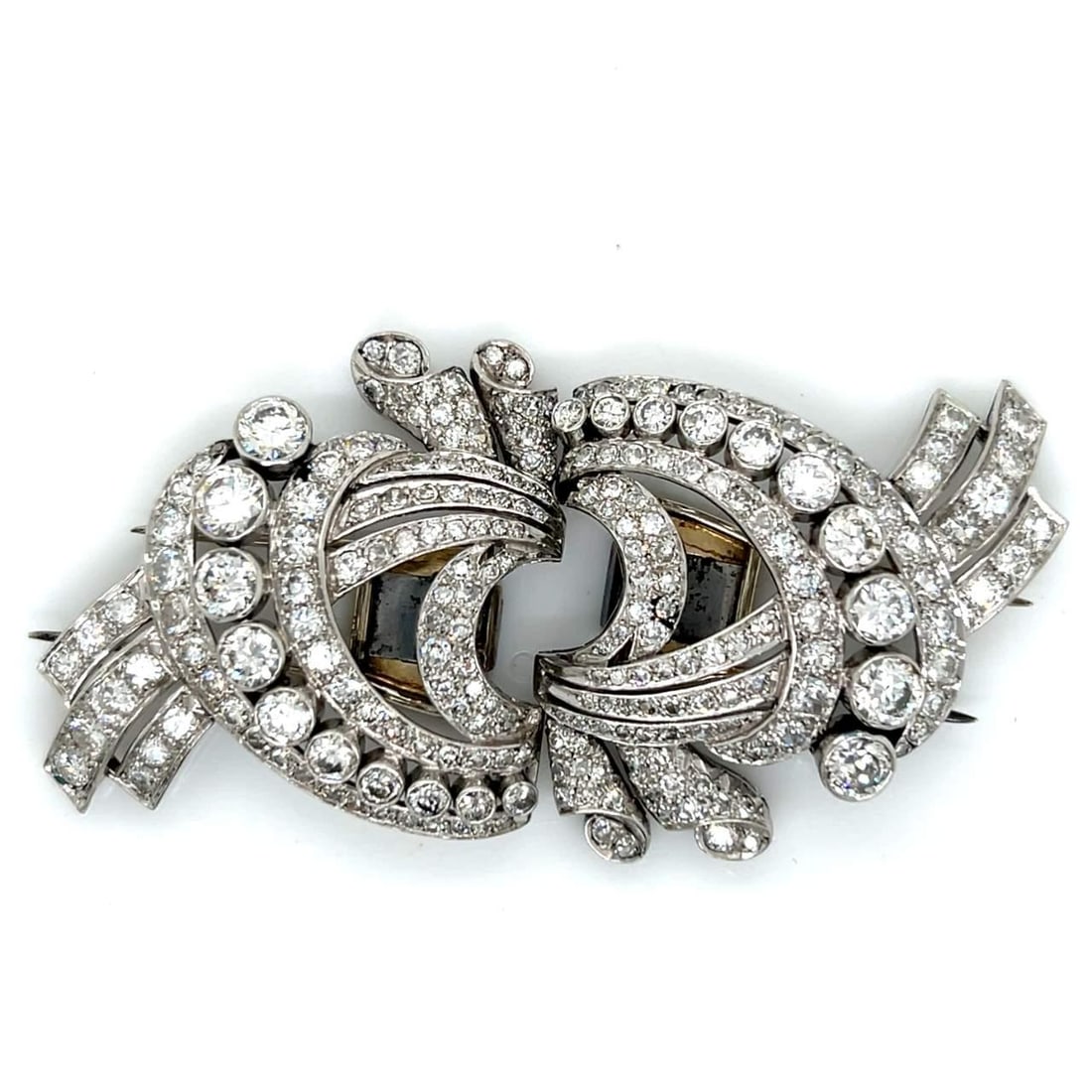 Art Deco Platinum Clips with 12.00 Ct G-H Diamonds: Art Deco Platinum Clips with 12.00 Ct G-H Diamonds This exquisite pair of Art Deco clips showcases the elegance of a bygone era, crafted in platinum and adorned with a stunning total of 232 European-c
