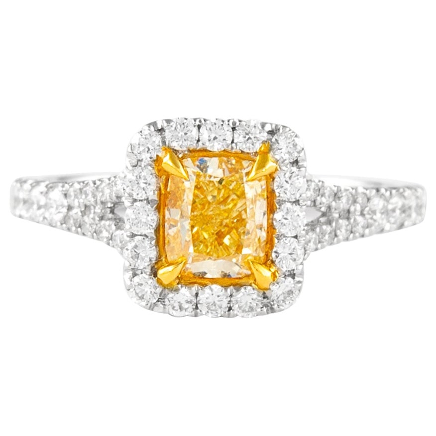 1ct Fancy Intense Yellow Diamond Halo Ring 18k Gold EGL Certified: 1ct Fancy Intense Yellow Diamond Halo Ring 18k Gold EGL Certified This stunning contemporary ring showcases a 1ct Fancy Intense Yellow Pear Diamond surrounded by a halo of sparkling diamonds. Crafted